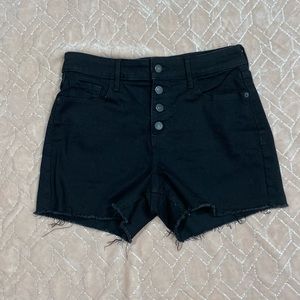 Black shorts with fringed bottoms